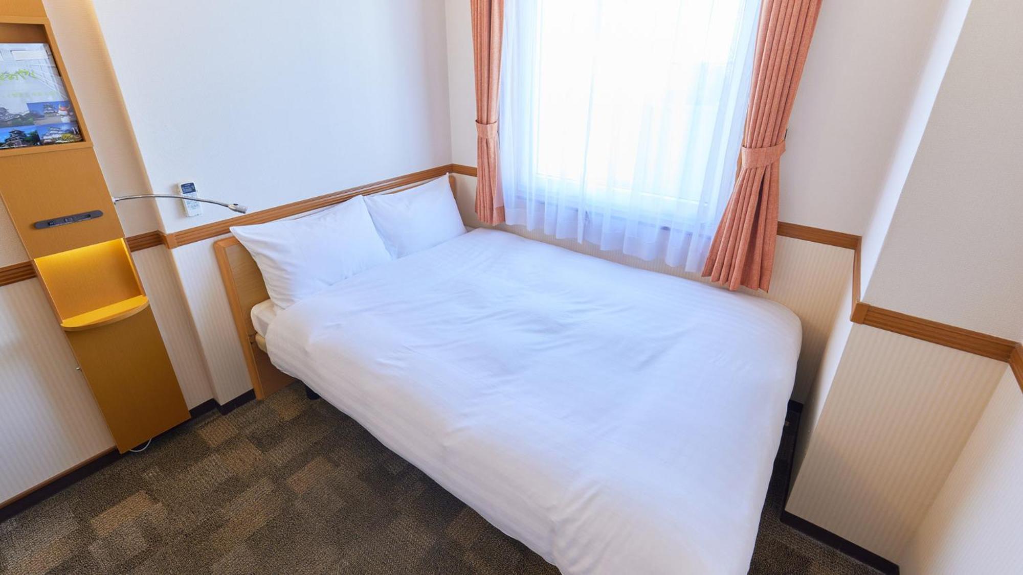 Toyoko Inn Nagoya-Eki Shinkansen-Guchi Rum bild